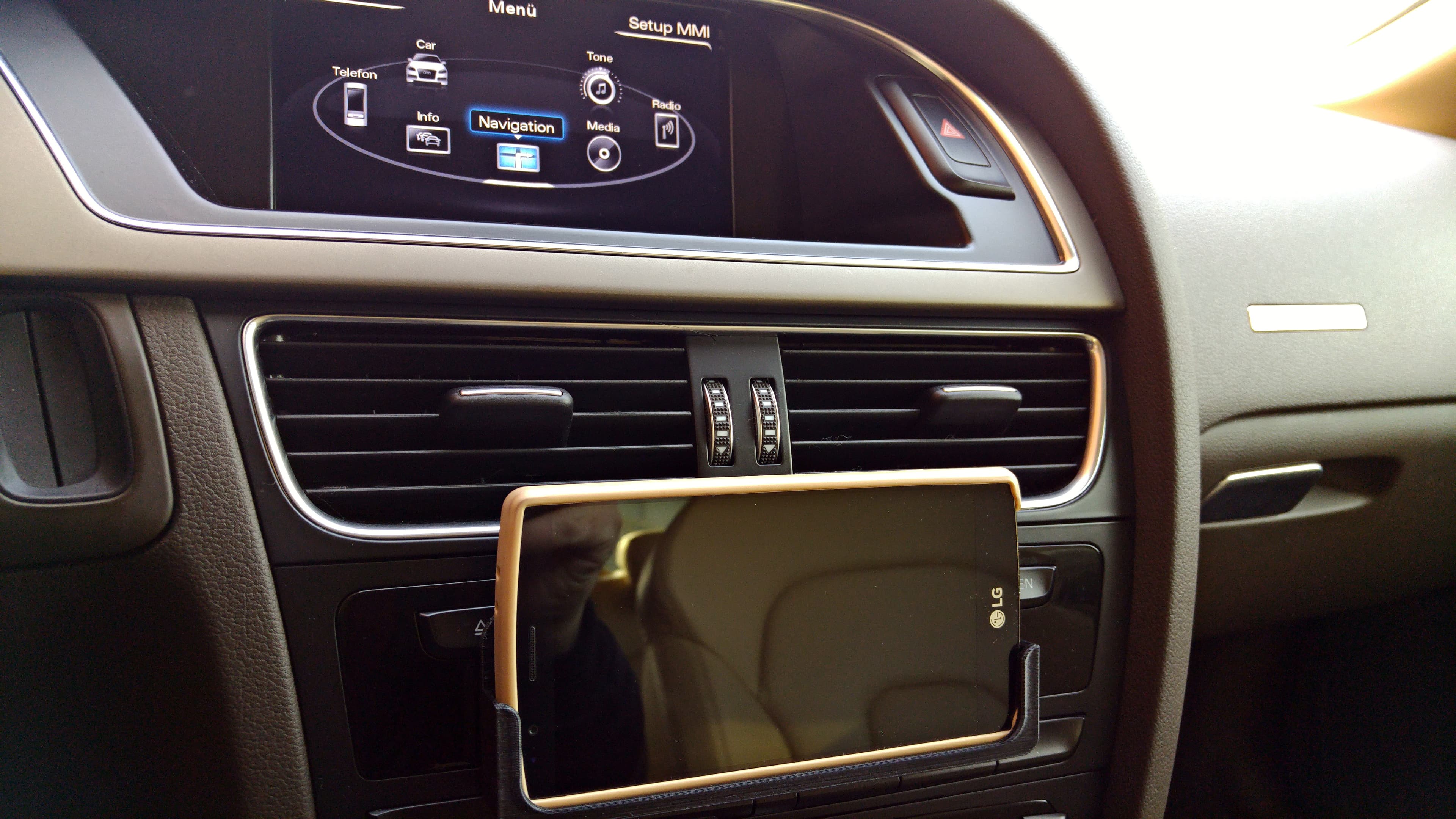 Photo of LG G4 (with phone case) Stand for Audi A5 or A4 with MMI