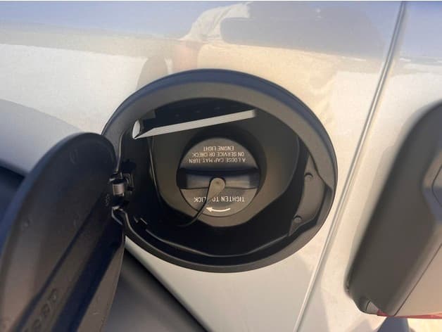 Jeep Wrangler hidden ice scraper fuel door - image 2 of 6
