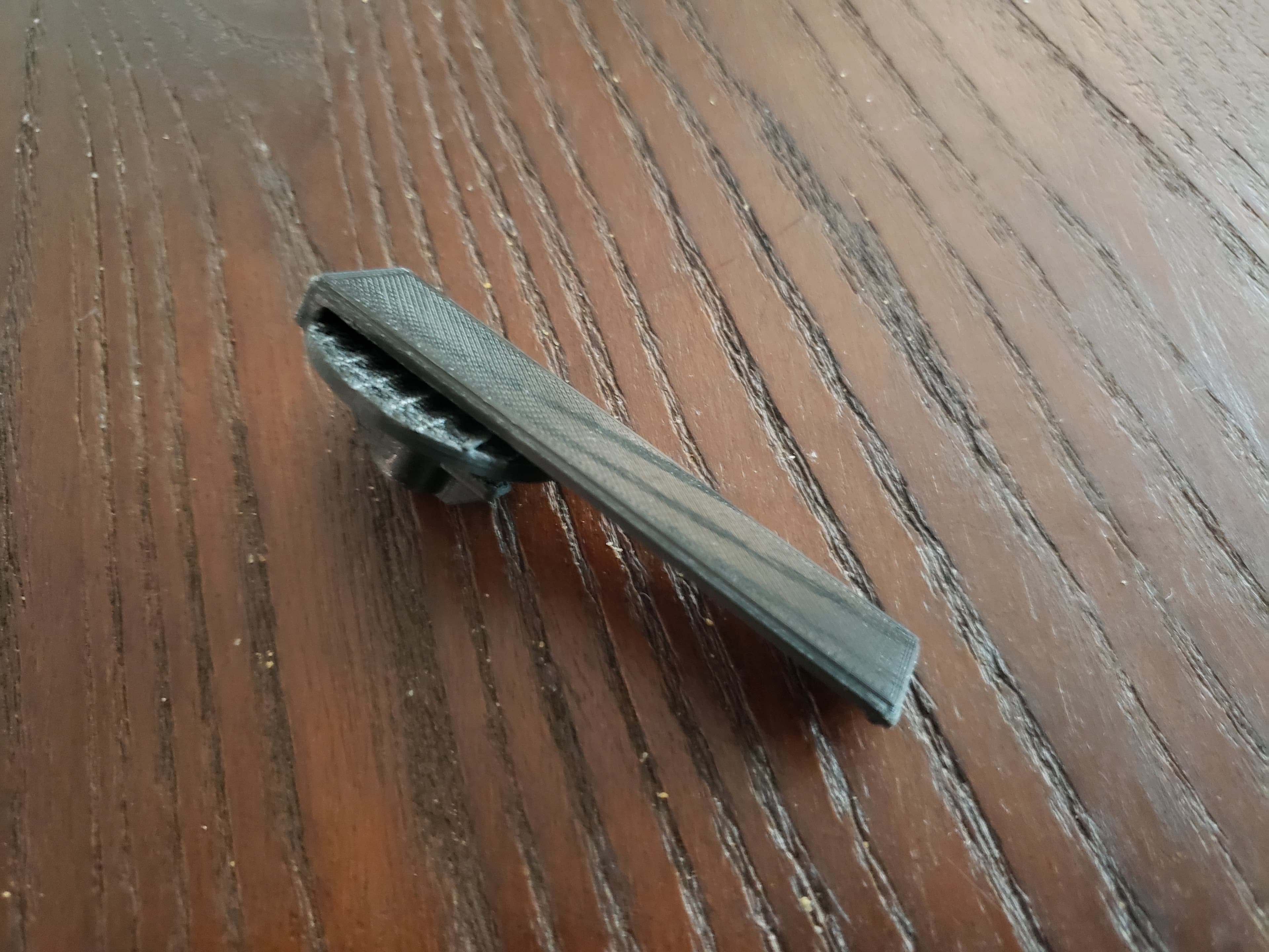 Photo of Chrysler Pacifica Seat Belt Clip (Mopar 6LG61PD2AA) compatible