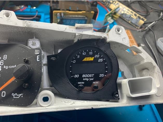 Supra Mk3 cluster's boost gauge adapter for AEM x-series gauge preview