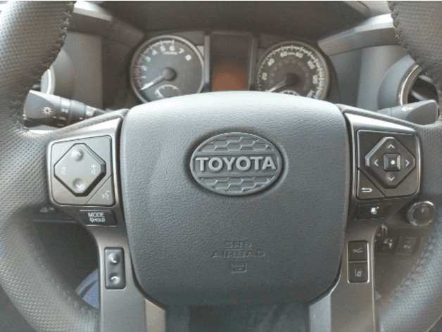 Photo of Toyota Tacoma Replacement steering emblem - Pro Grille