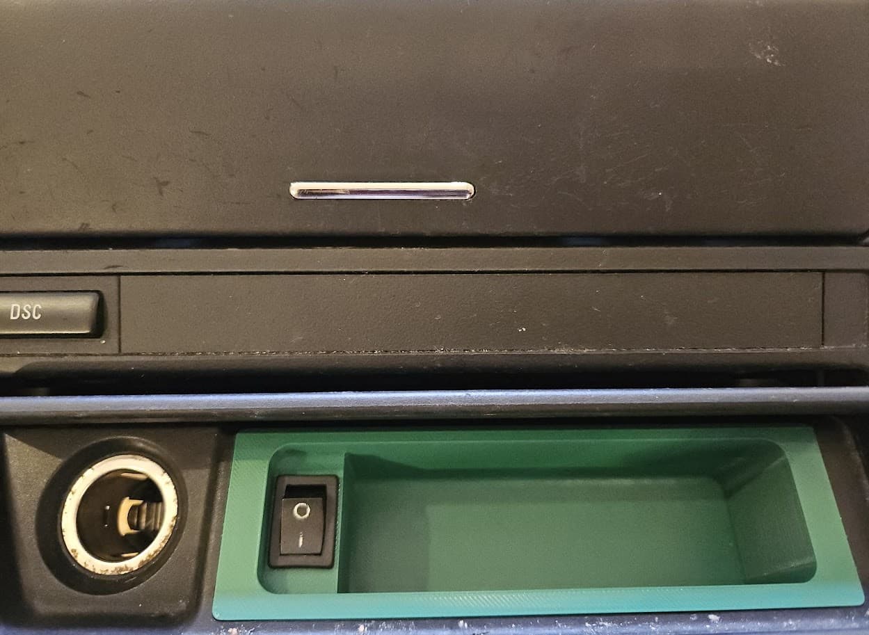 BMW E46 ashtray with switch for toggling cigarette lighter/12V outlet - image