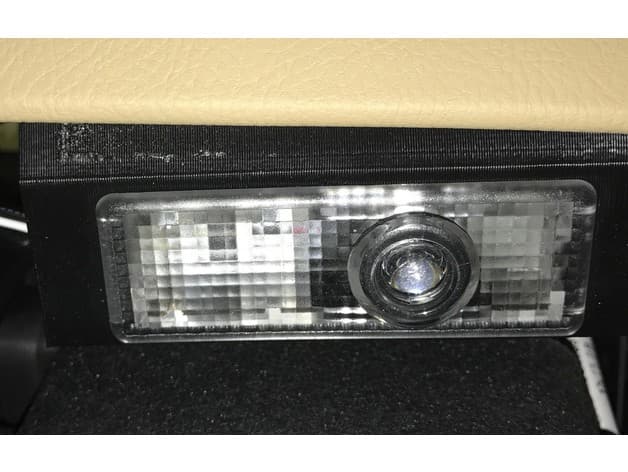 Courtesy light holder - image