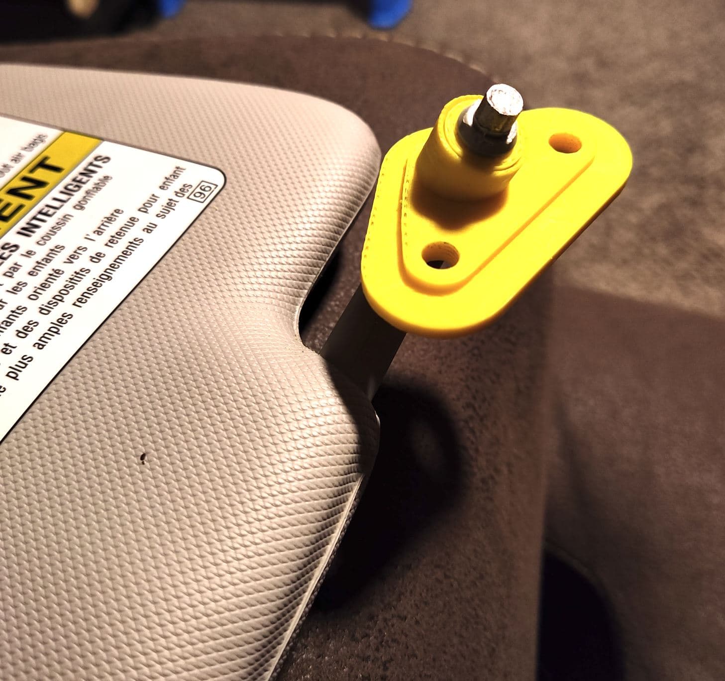 Subaru Sun visor mounting bracket. - image