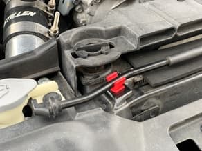 Photo of Nissan hood prop rod clip