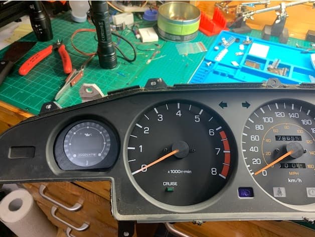 Supra Mk3 cluster's left gauge adapter for Innovate gauge preview