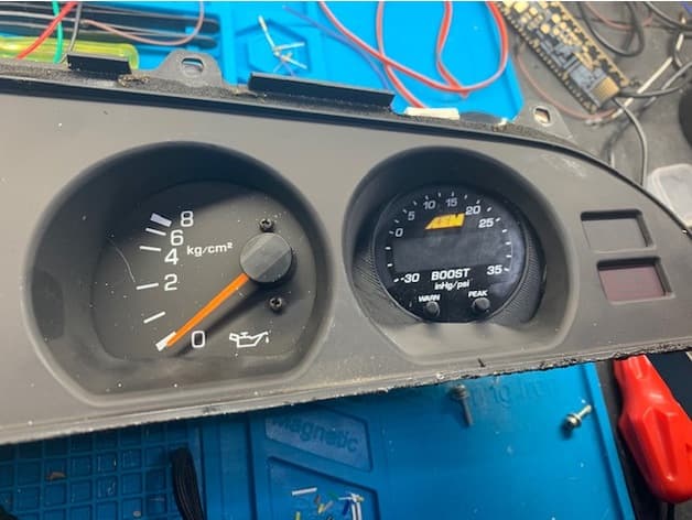 Supra Mk3 cluster's boost gauge adapter for AEM x-series gauge preview