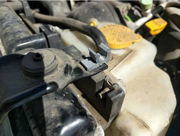 Photo of 2001 Subaru Forester hood support bar clip