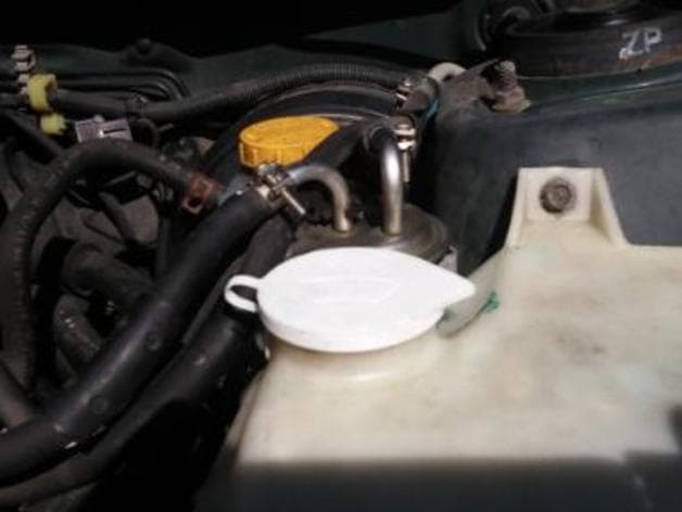 Photo of 2000 Subaru Forester winshild washer cap