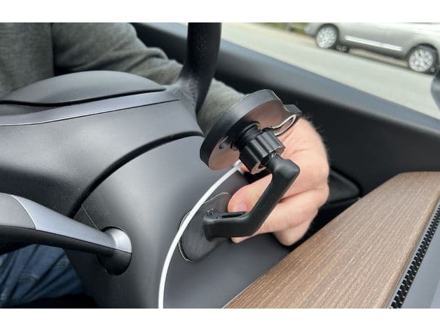 Photo of Tesla Model 3/Y MagSafe Mount Behind Steering Wheel
